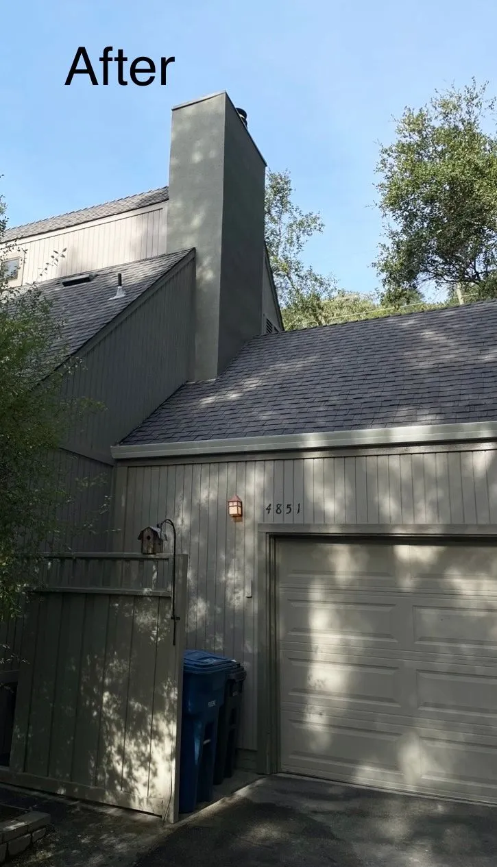 Chimney re-clad in smooth stucco matched to the home's siding color (after) — brick facade waterproofing